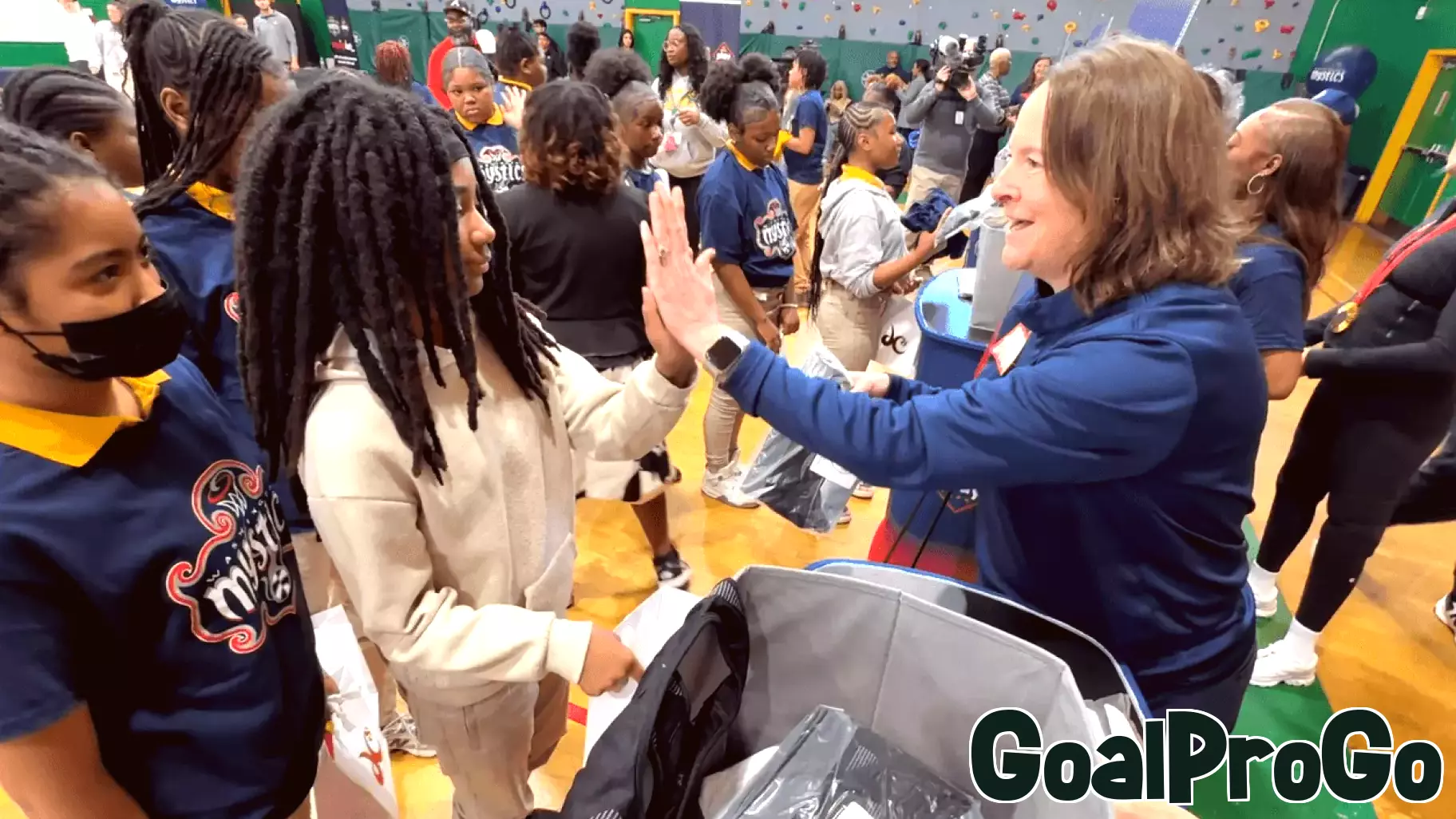 Hundreds of girls in DC public schools receive free sports bras to help close gender gap